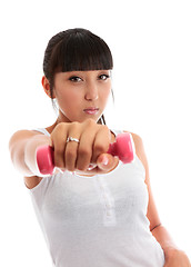 Image showing Young woman using hand weights