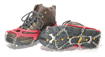 Image showing Hiking Boots with ice cleats or crampons