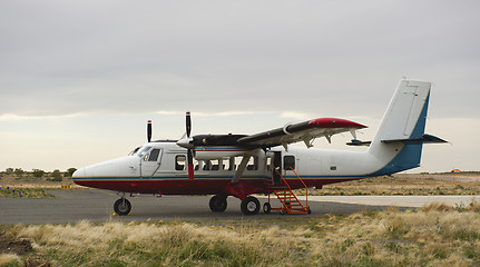 Image showing Tour plane on landing strip