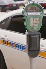 Image showing Traffic meter and Sheriff car
