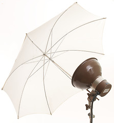 Image showing Electronic flash head and umbrella