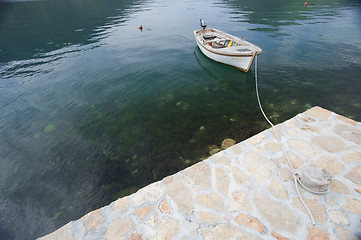 Image showing Small boat tied to jetty