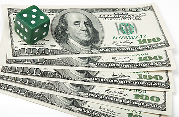 Image showing Green dice and American money