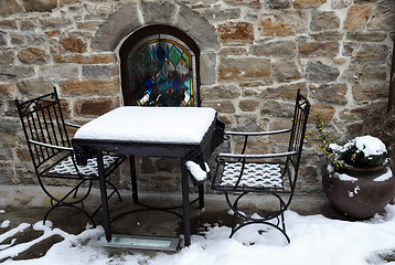 Image showing Table and Chairs Covered With Snow