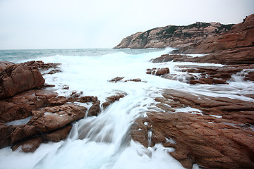 Image showing Beautiful seascape. Sea and rock at the sunset. Nature compositi