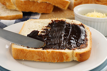 Image showing Spreading Vegemite