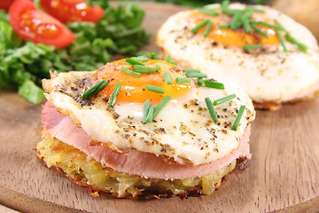 Image showing Hash browns with fried egg