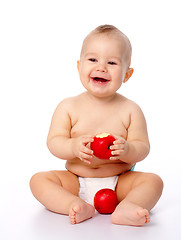 Image showing Little child with apple