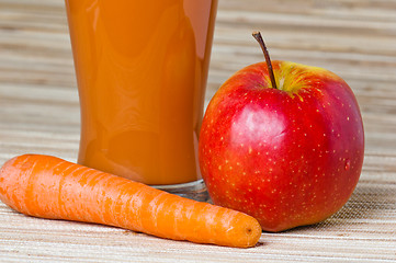 Image showing Carrots, apple and juice