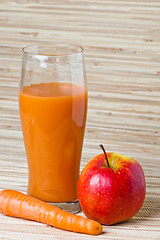 Image showing Carrots, apple and juice