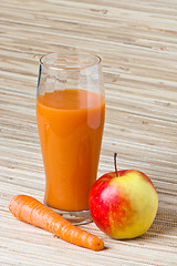 Image showing Carrots, apple and juice