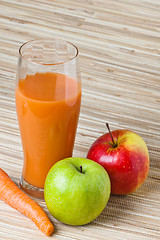 Image showing Carrots, apple and juice