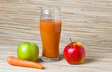 Image showing Carrots, apple and juice