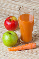 Image showing Carrots, apple and juice