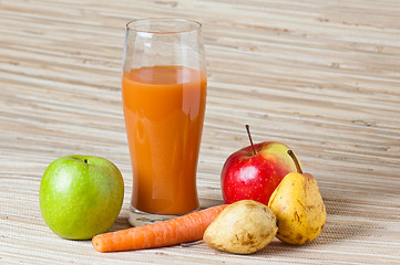 Image showing Carrots, apple and juice