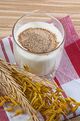 Image showing Glass of milk and wheat ears