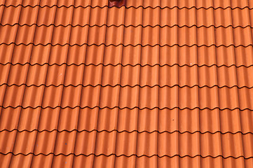 Image showing Old red tile roof. A background