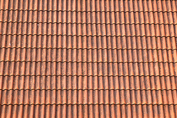 Image showing Old red tile roof. A background