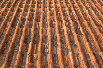 Image showing Old red tile roof. A background