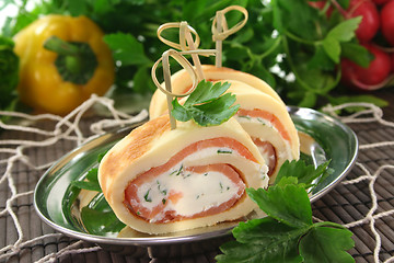 Image showing Pancakes with salmon and cream cheese