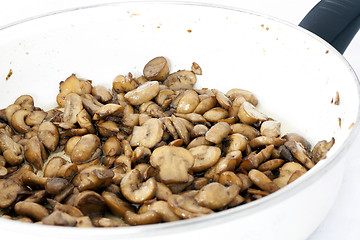 Image showing Fried mushrooms in pan