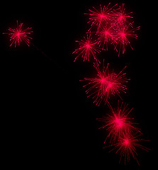Image showing Festive red fireworks at night
