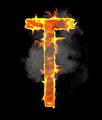 Image showing Burning and flame font T letter over black 