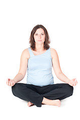 Image showing Portrait of pretty pregnant woman practicing yoga