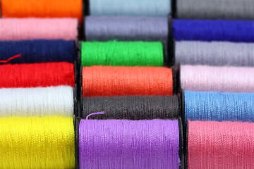 Image showing lot of colored thread spools