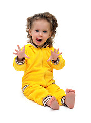 Image showing fun little girl in yellow sitting