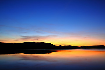 Image showing  morning lake with mountain before sunrise
