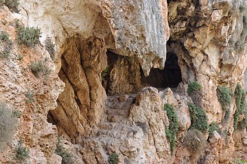 Image showing Cave entrance with jagged stone teeth