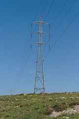 Image showing Two steel supports of overhead power transmission line in perspective