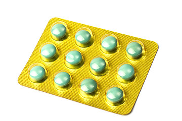 Image showing Package of green pills isolated on white