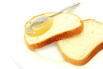 Image showing white bread with a honey