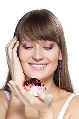 Image showing happy girl with cake isolated