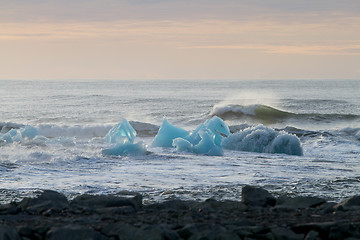 Image showing Turquoise ice in the water