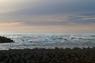 Image showing Turquoise ice in the water