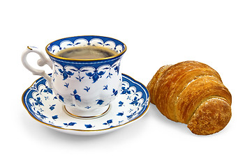 Image showing Coffee in a cup with a blue pattern and croissant