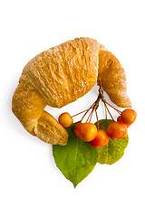 Image showing Croissant with a sprig of apple