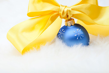 Image showing Christmas ball with yellow ribbon bow