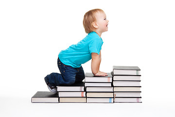 Image showing A toddler creeping for knowledge