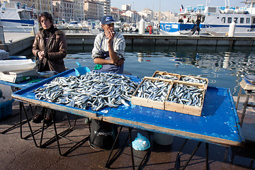 Image showing MARSEILLE, FRANCE, MARCH 6: fishmongers on the open-air market of the Vieux-port, on Sunday, March 6th, 2011, in Marseille, France