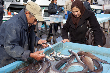 Image showing MARSEILLE, FRANCE, MARCH 6: a fish salesman on the open-air market of the Vieux-port, on Sunday, March 6th, 2011, in Marseille, France