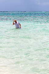 Image showing Senior Citizen Snorkeling in Tropical Waters