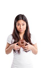 Image showing Asian woman with donut