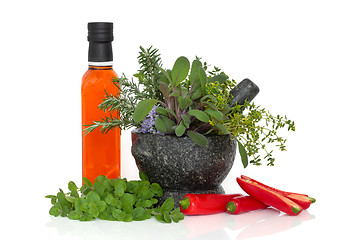 Image showing Chili Oil, Herbs and Chilies