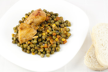 Image showing Chicken with peas, carrots, corns and bread