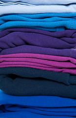 Image showing Folded blue, purple and indigo clothes