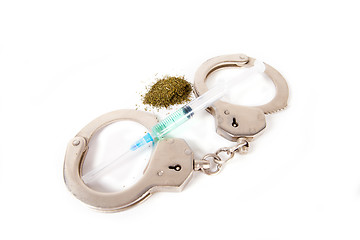 Image showing Handcuffs and syringe